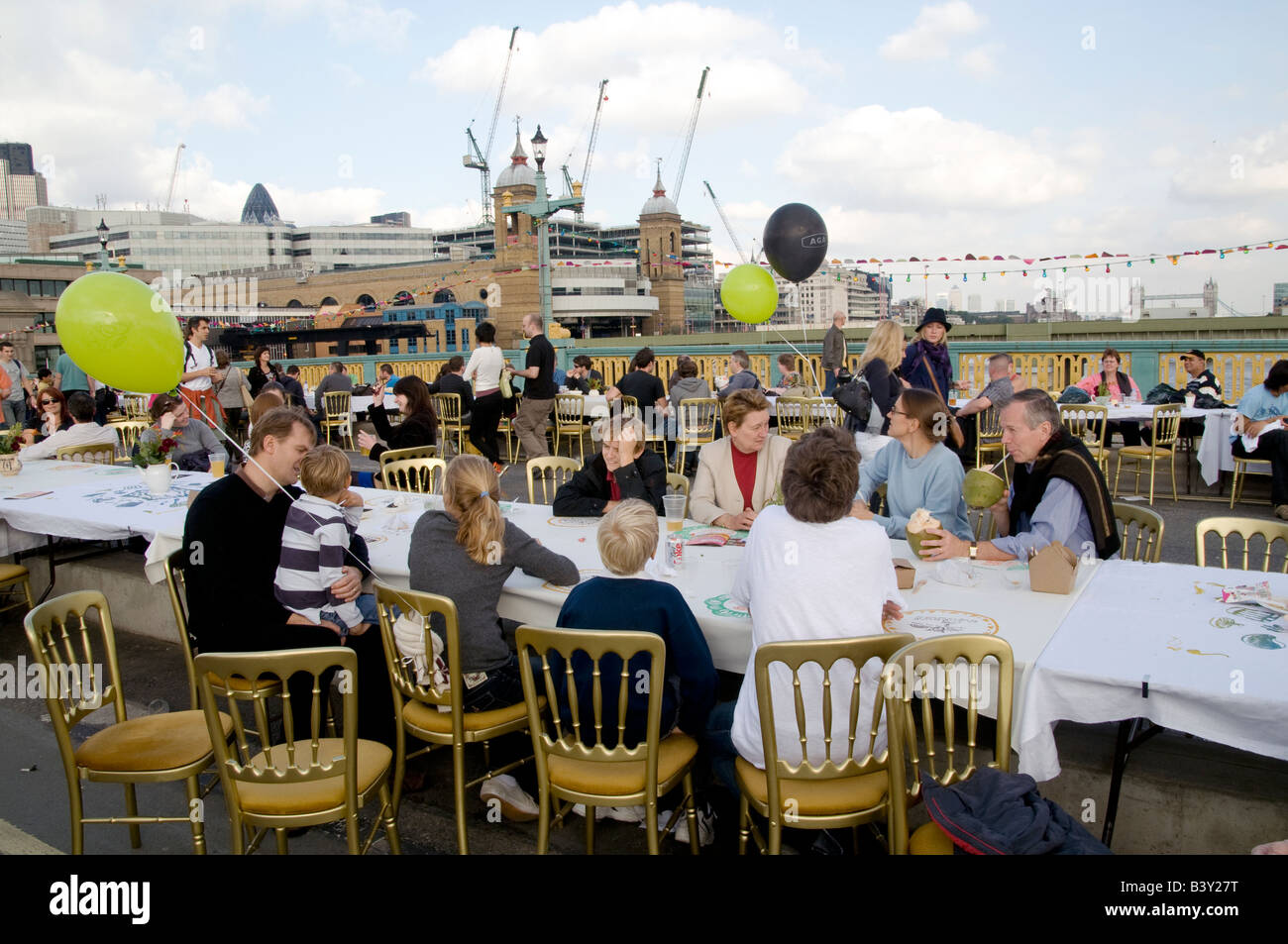 UK-Families enjoying open air buffet as part of Thames Festival in ...