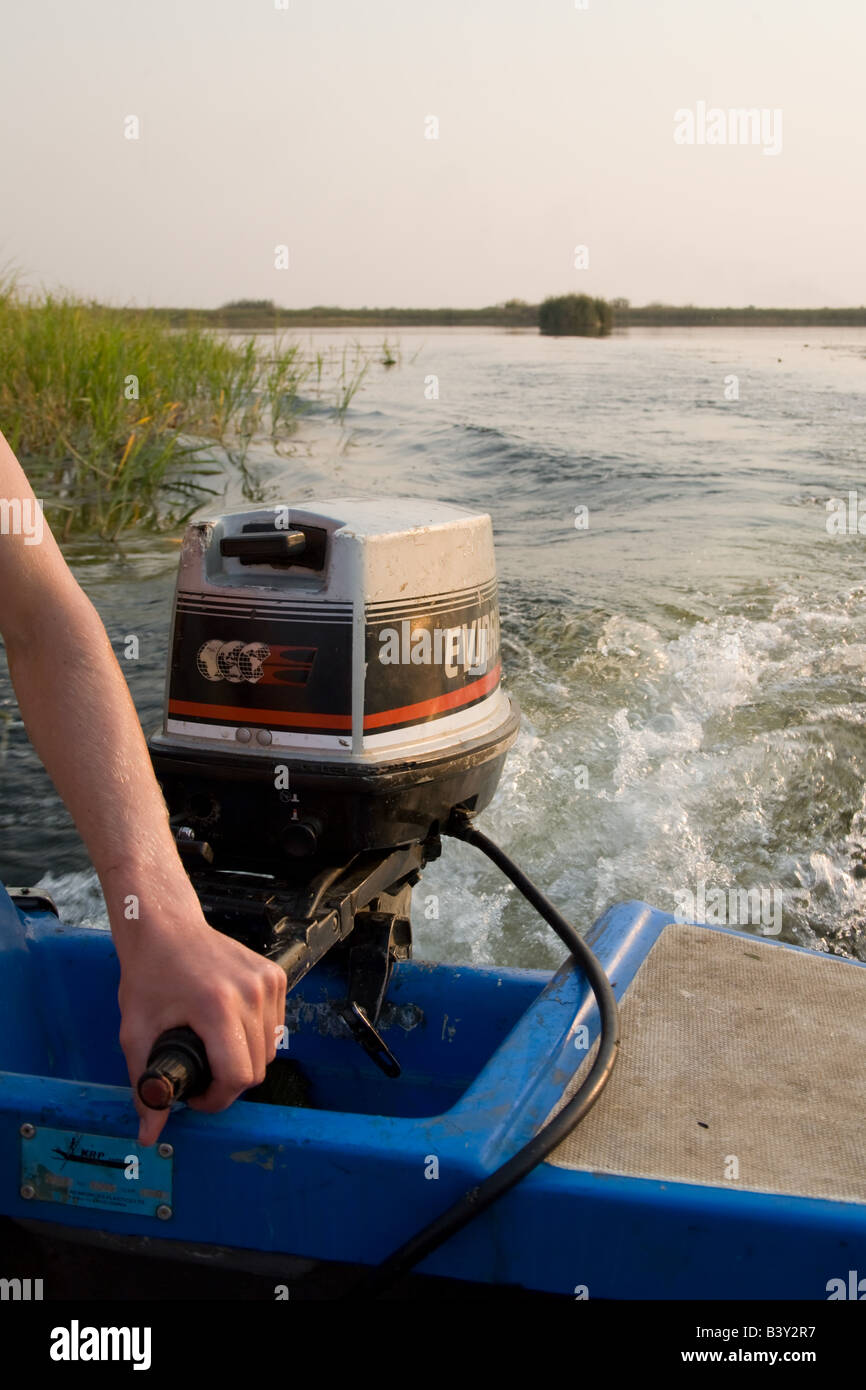 Outboard motor and boat Kafue river Zambia Africa Stock Photo Alamy