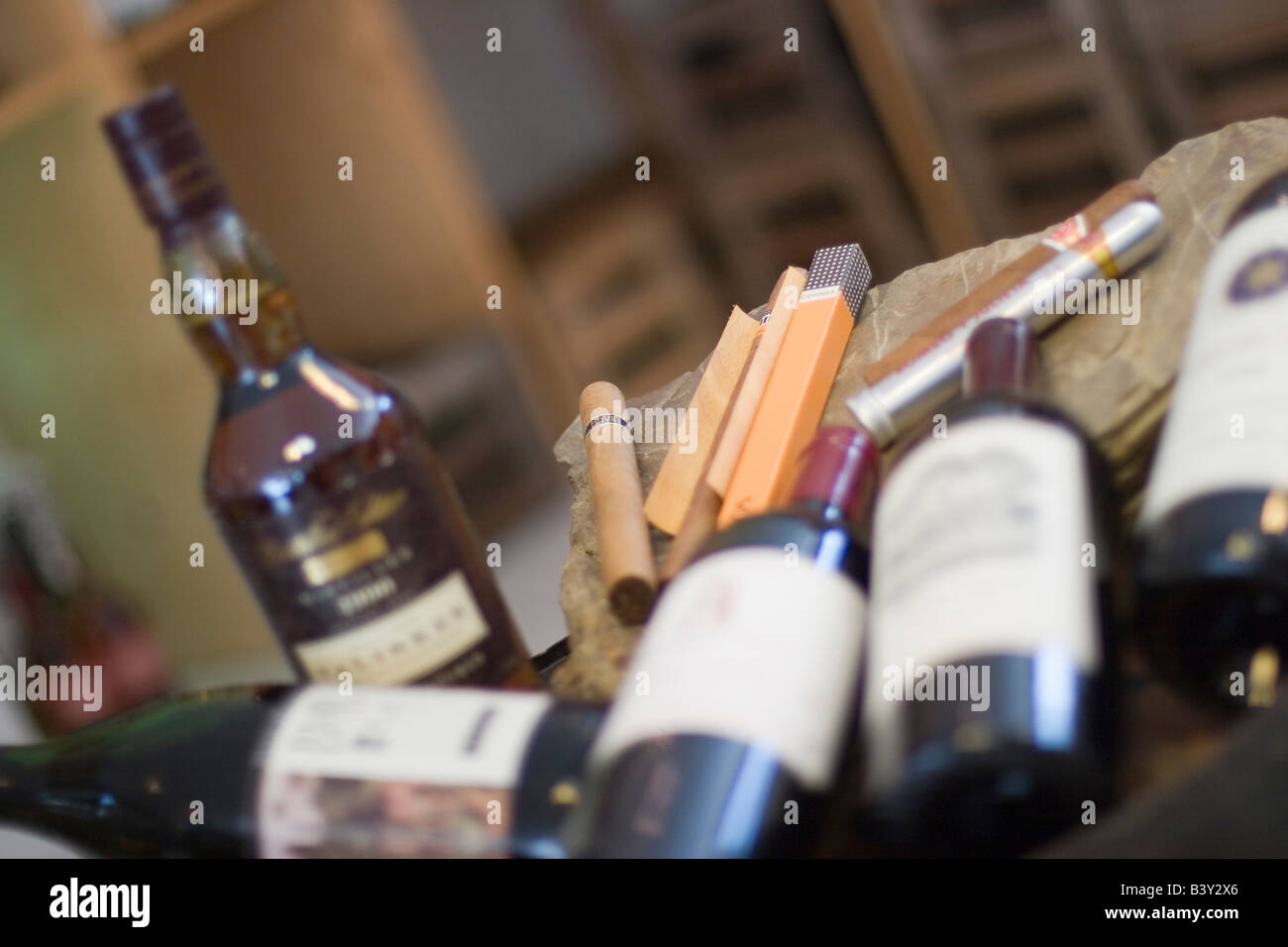 bottles of wine and whisky with cigars Stock Photo