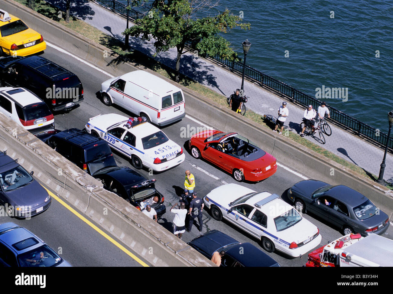 Aerial view of an automobile accident on the East River Drive. Rubbernecking cars. Traffic congestion high angle view of driving in New York City USA Stock Photo