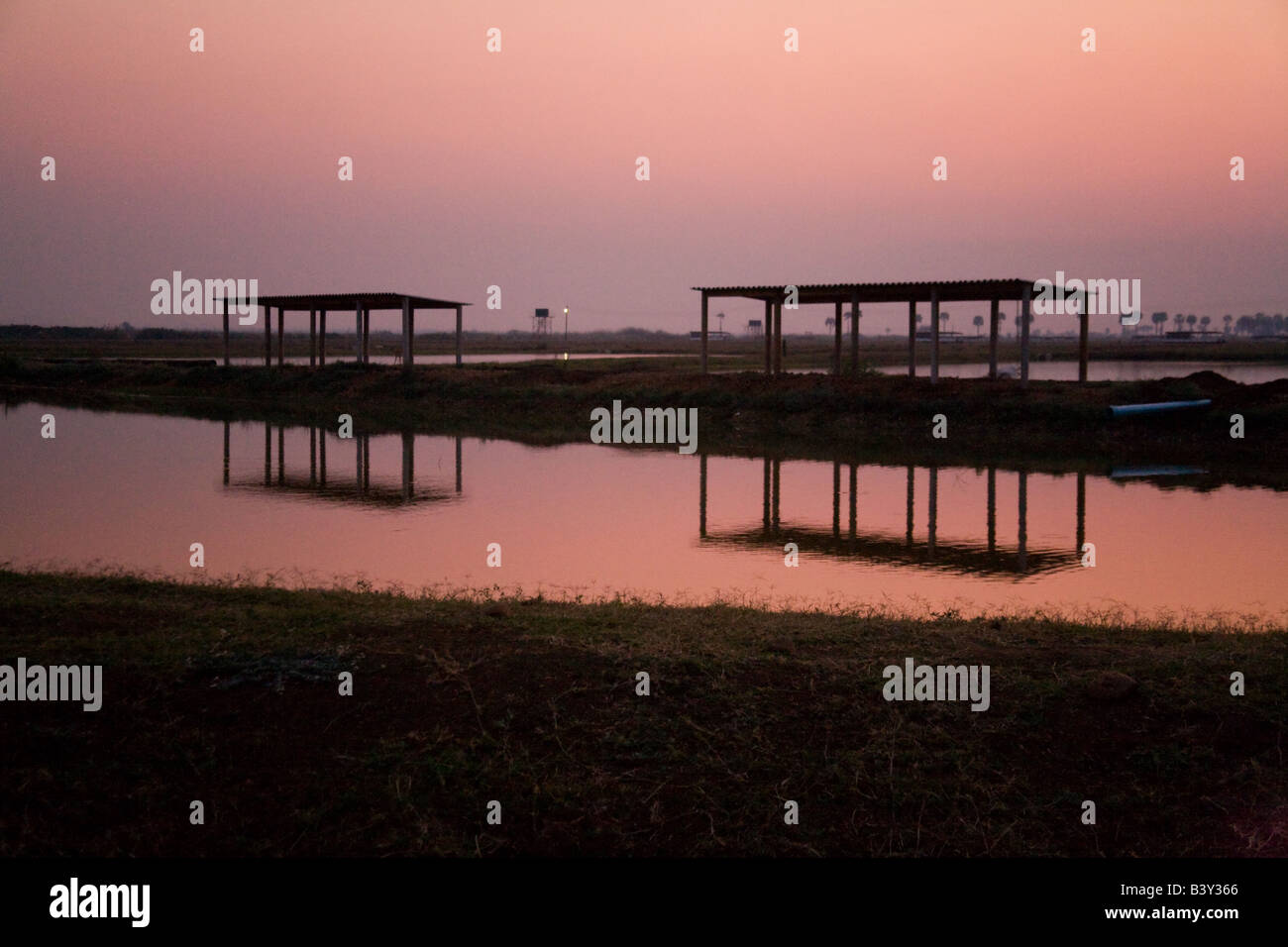 Sunset over the fish ponds at kafuie fisheries Zambia Africa Stock