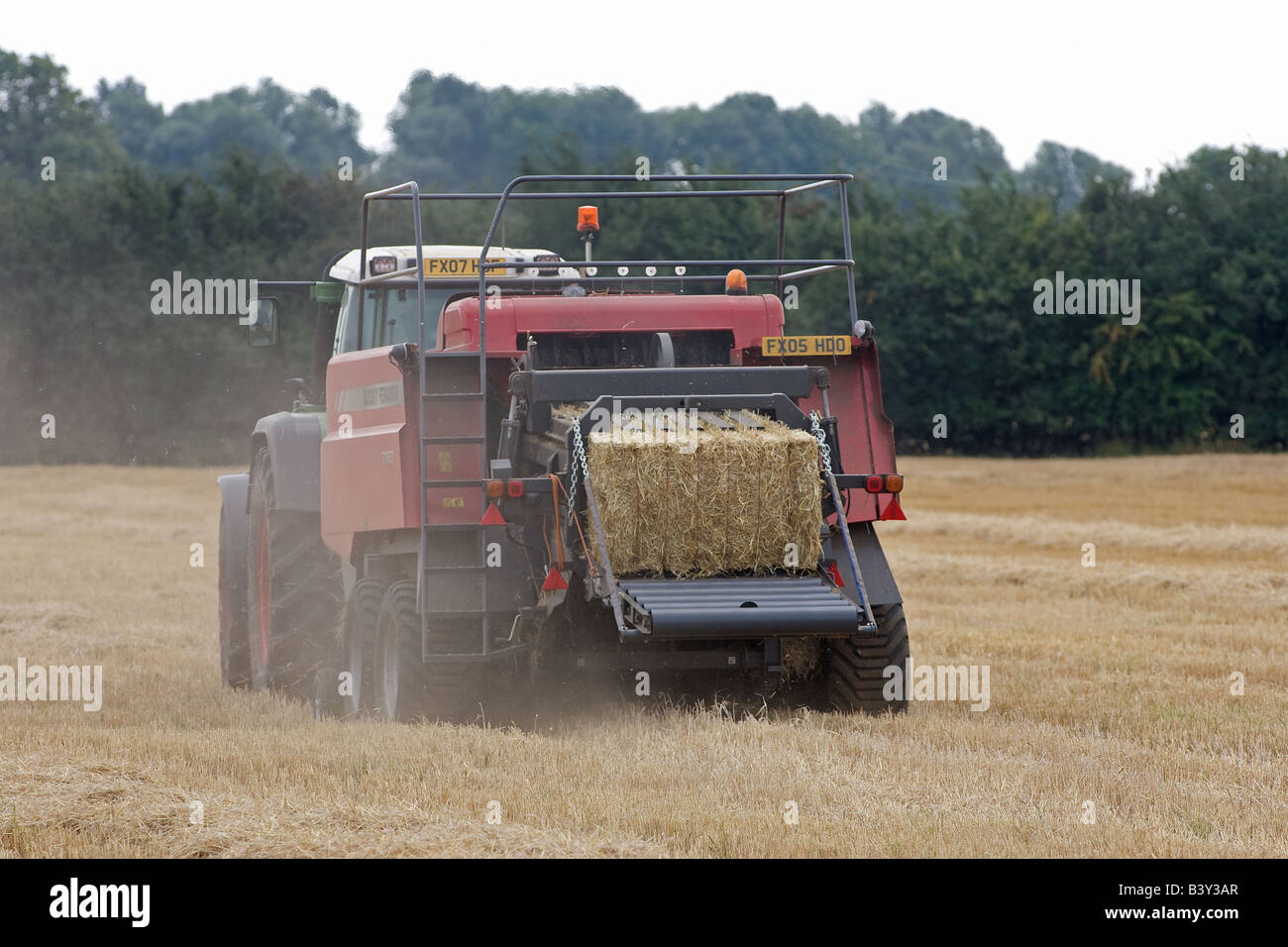 Fendt Tractor Baling With Massey Ferguson Baler Stock Photo - Alamy