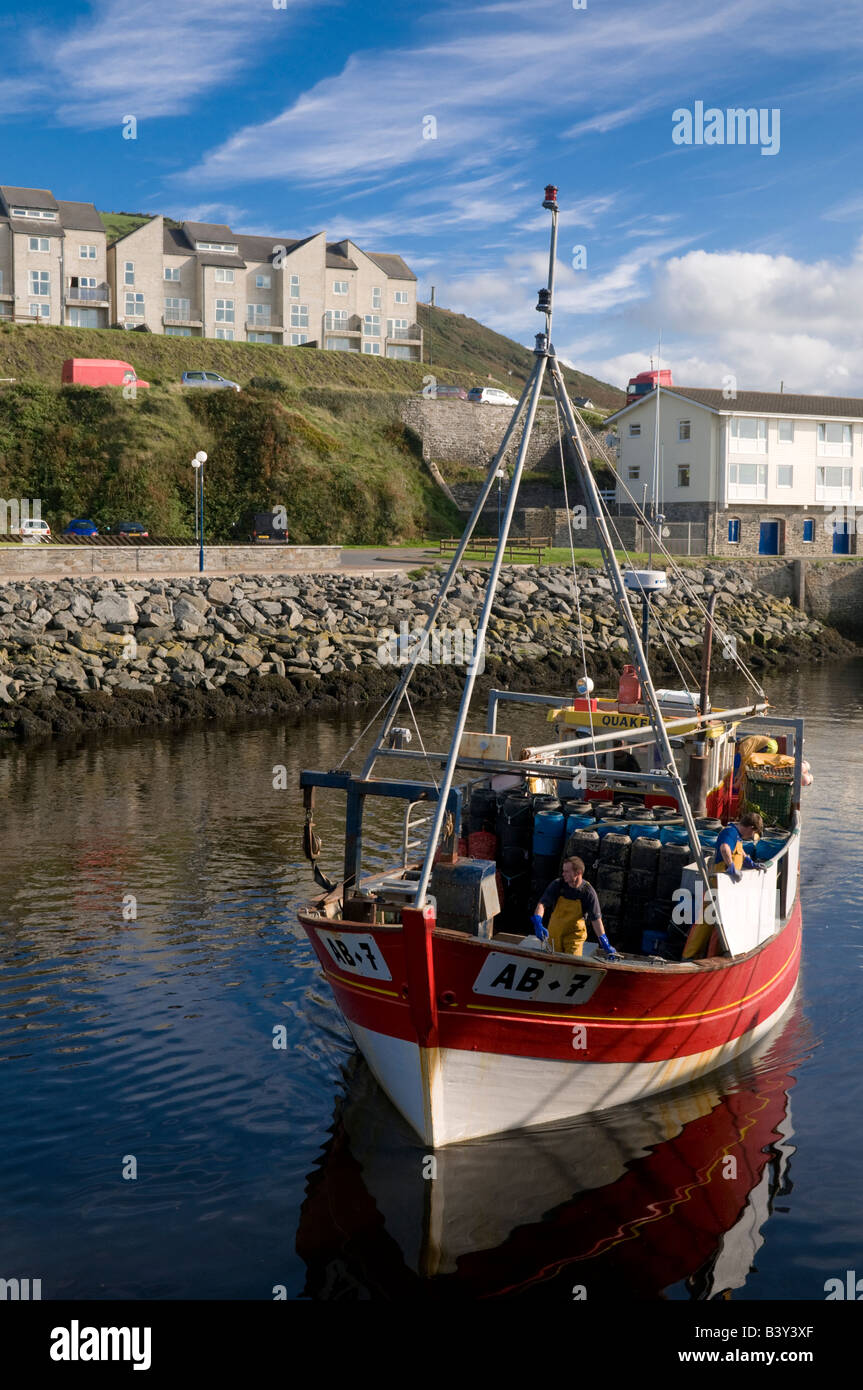 Inshore fishing boat in Aberystwyth harbour and marina summer afternoon Wales UK Stock Photo