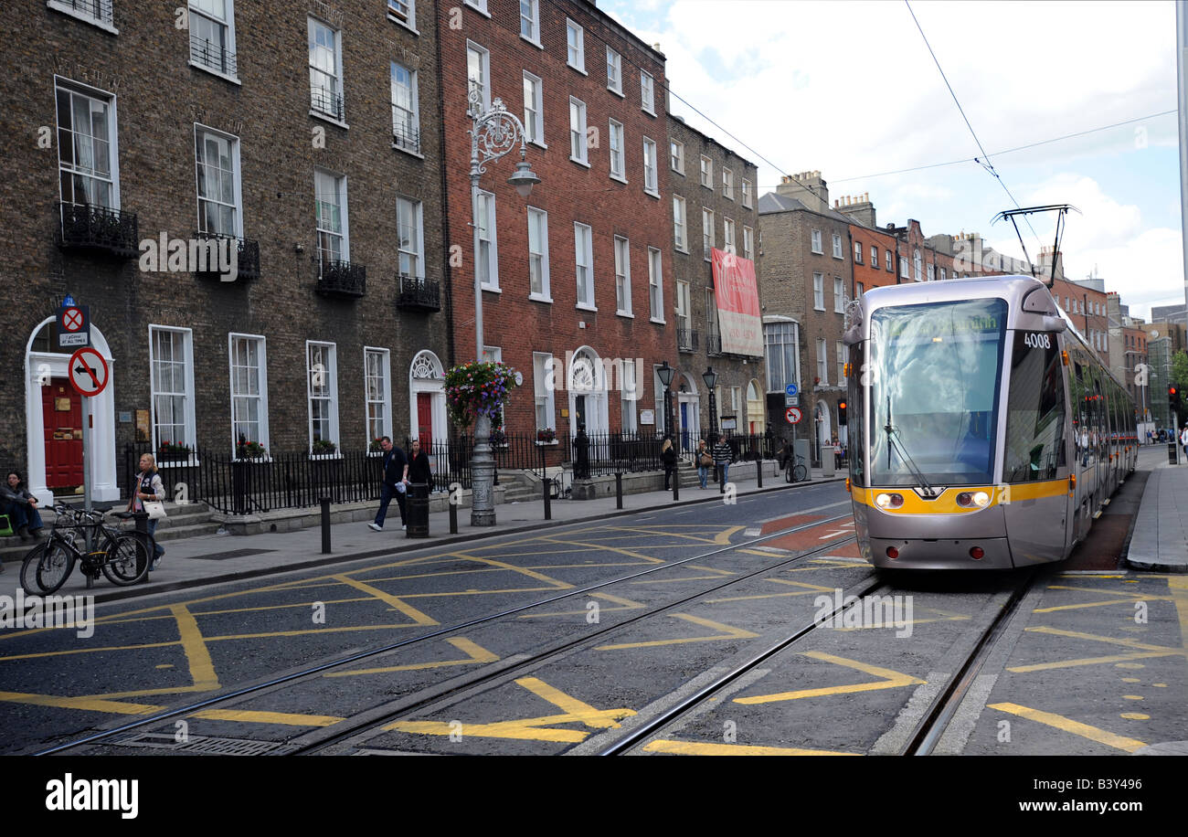 The Luas tram in Harcourt Street near the Iveagh gardens Stock Photo