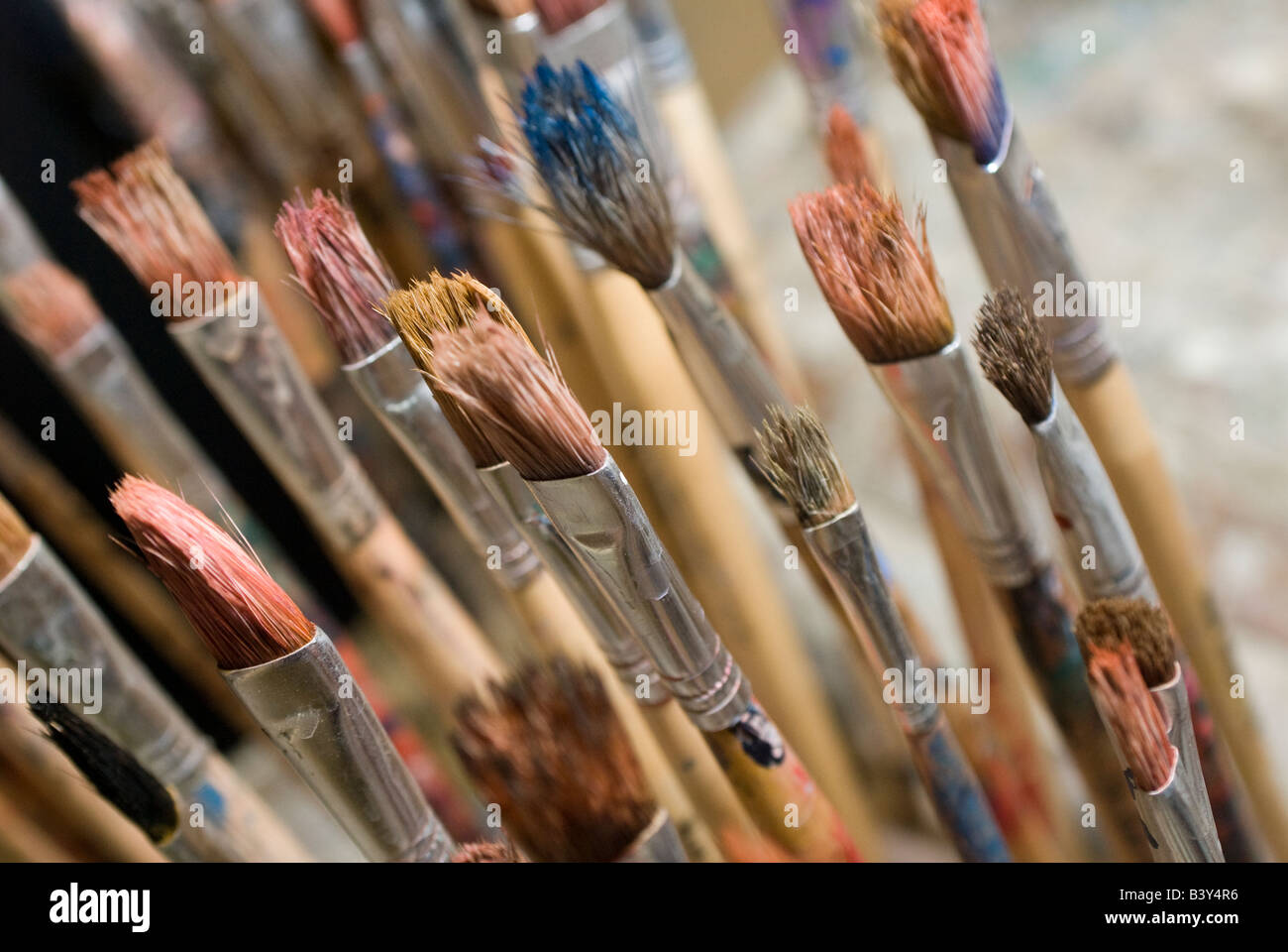 paint brushes in a school classroom in the uk Stock Photo Alamy