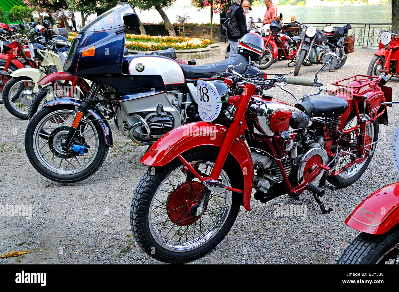 BMW motorcycle and Motoguzzi motorcycle in rally of vehicles in