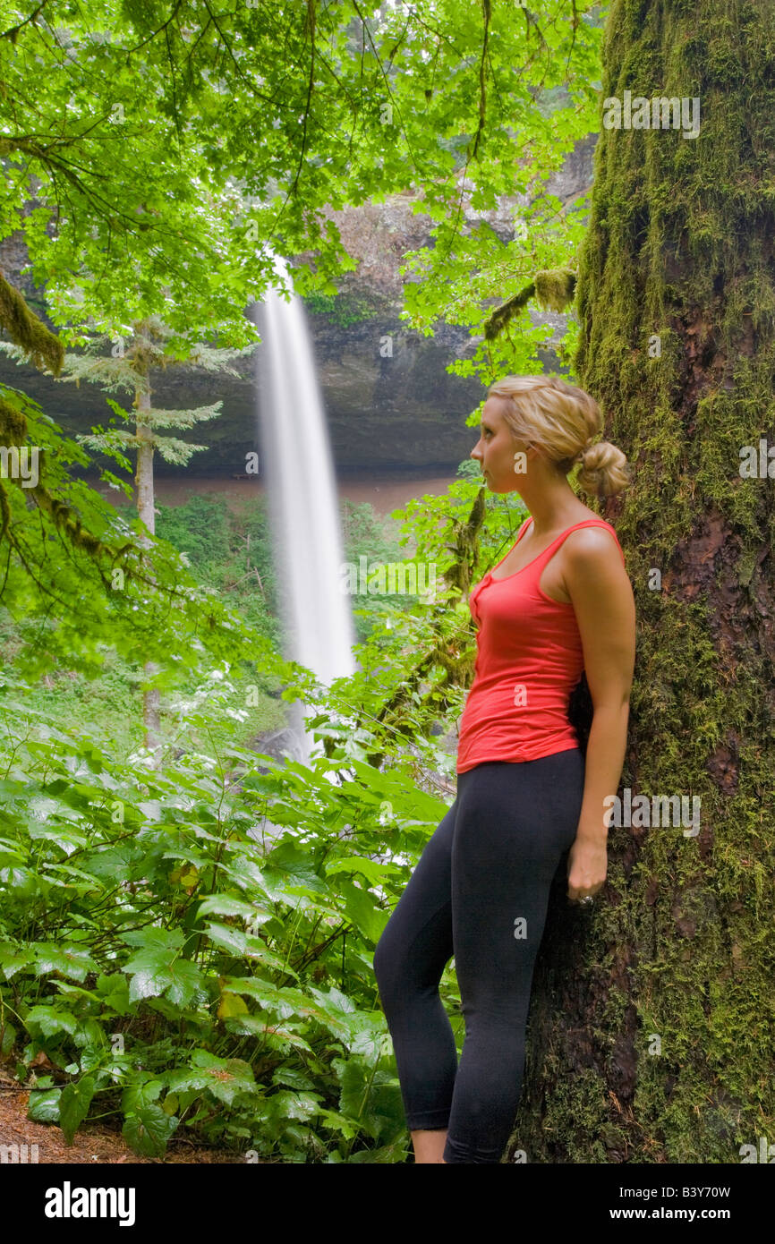 Young Woman Hiking At Silver Falls State Park At North Falls