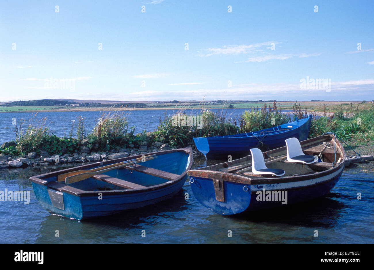 Scotland, Caithness. Trout fishing boats on Loch Watten Stock Photo Alamy