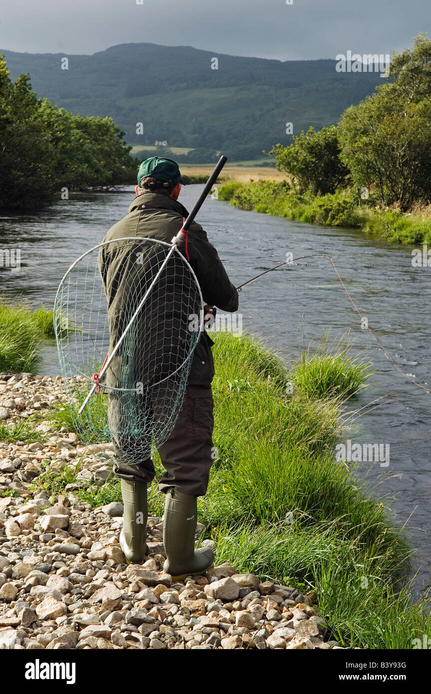 Scotland, Hebrides, Mull. A salmon fisherman fly fishing the Drumlaing  Glide on the southern bank of the River Ba on the Benmore Estate Beat Stock  Photo - Alamy