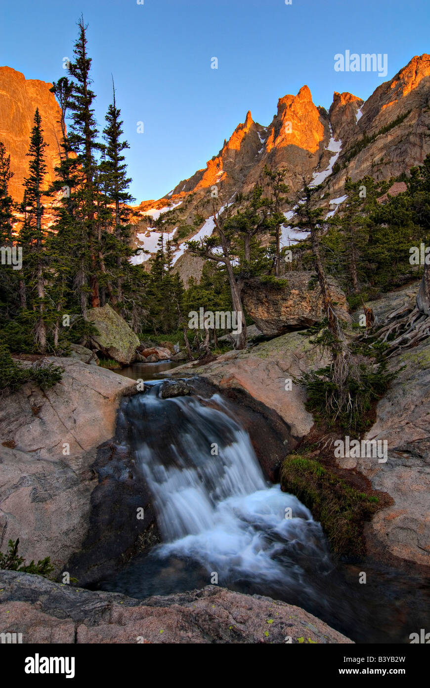 USA, Colorado, Rocky Mountain NP.  Tyndall Creek and Hallet Peak at sunrise. Stock Photo