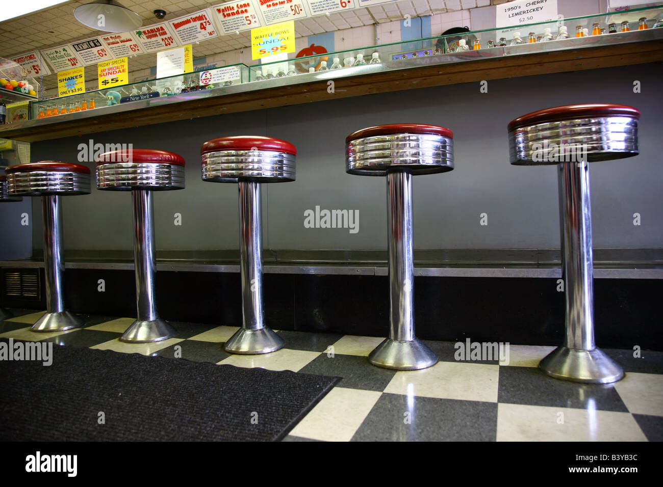Chrome stools at an oldfashioned ice cream parlor Stock Photo Alamy