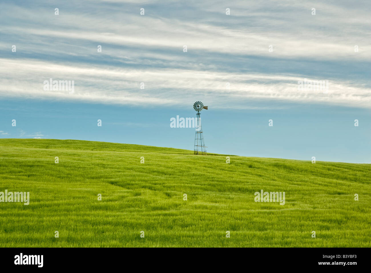 Windmill in wheat field The Palouse Washington Stock Photo