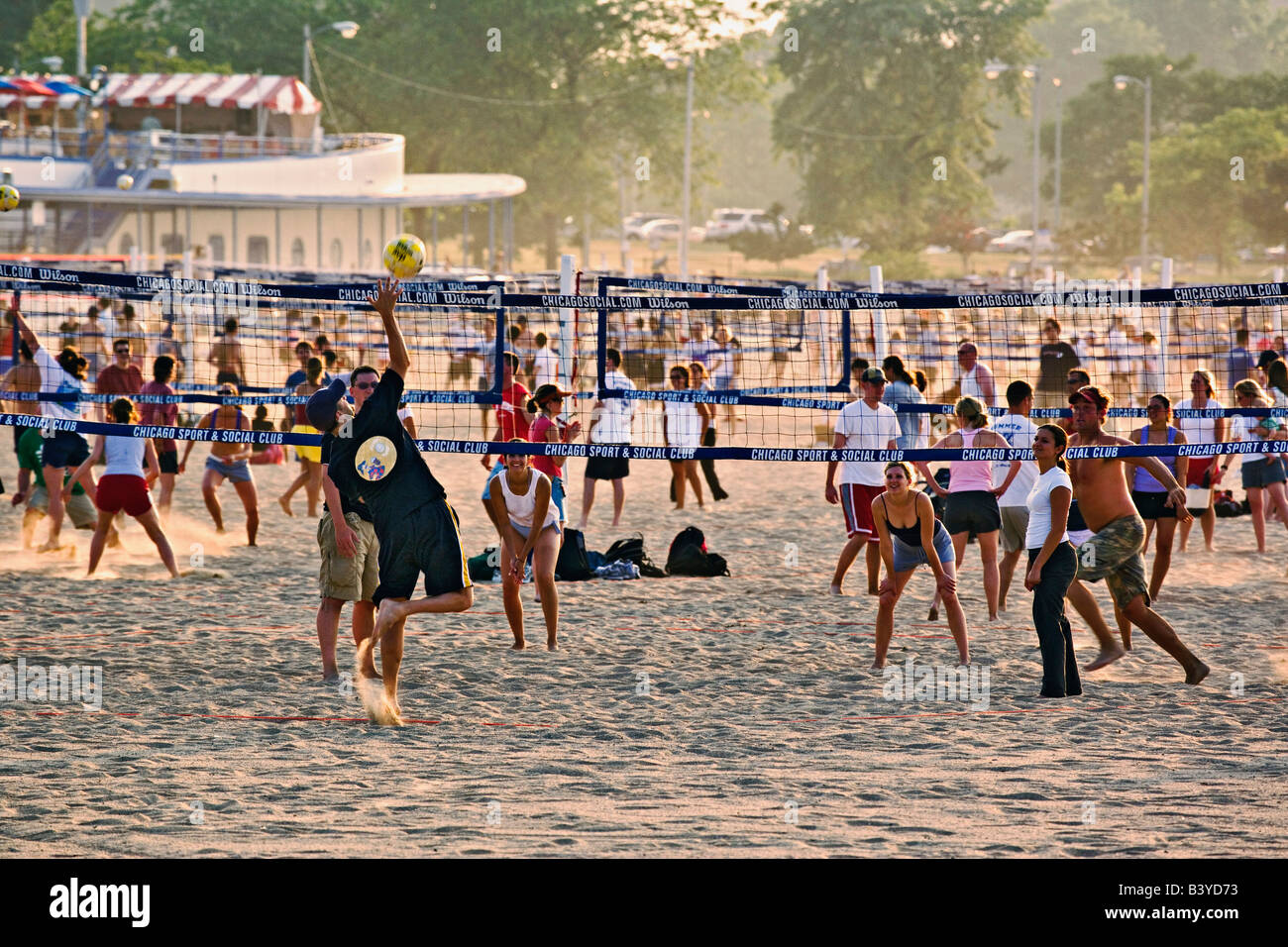 Volleyball game on beach along Lake Michigan, Chicago, Illinois Stock