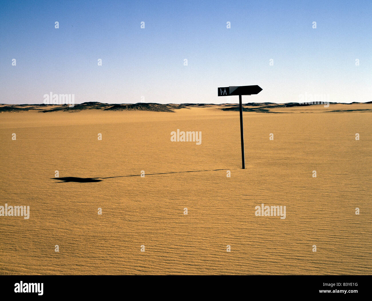 Sudan, An old signpost marks a disused track across the Nubian Desert, north of Old Dongola. It is marked in Arabic '108', which is probably the mileage from Karima to Dongola. The route across the desert now runs at least 10 km away from the sign. Stock Photo