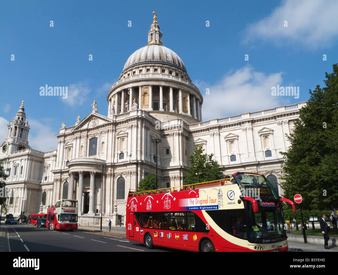 St Pauls Cathedral London UK and Red Tourist Open Top Bus Stock Photo