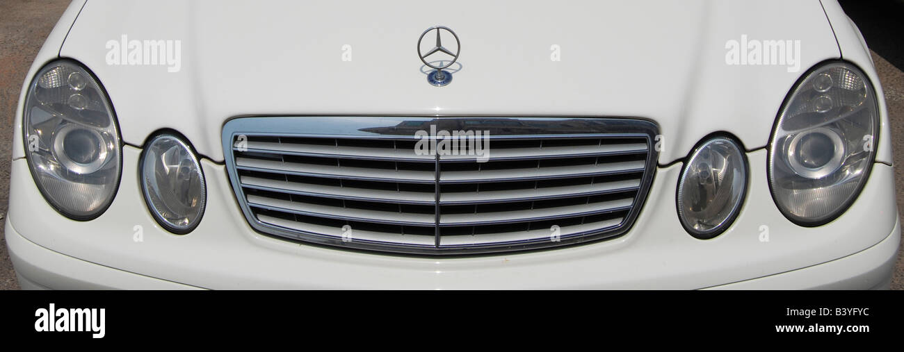 Panoramic view of front grill of a white Mercedes Benz Stock Photo