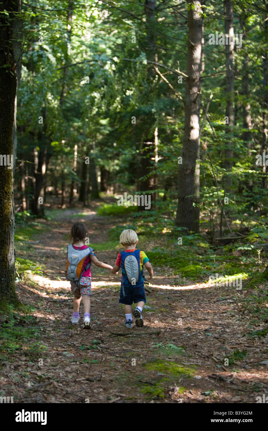 A young brother and sister go hiking in North Hampton New Hampshire USA (MR) Stock Photo