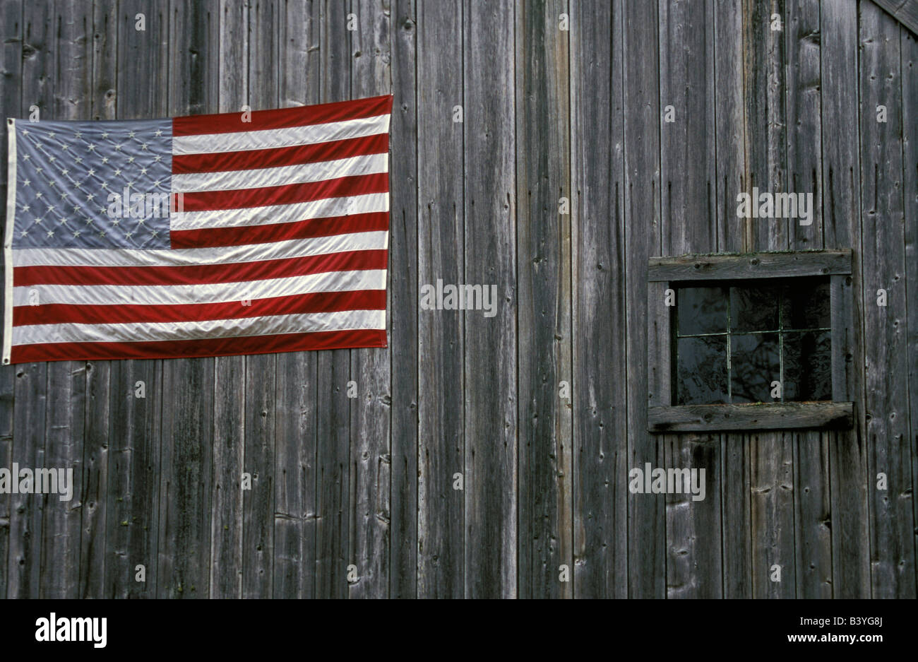 North America, United States, New England. American Flag on barn. Stock Photo