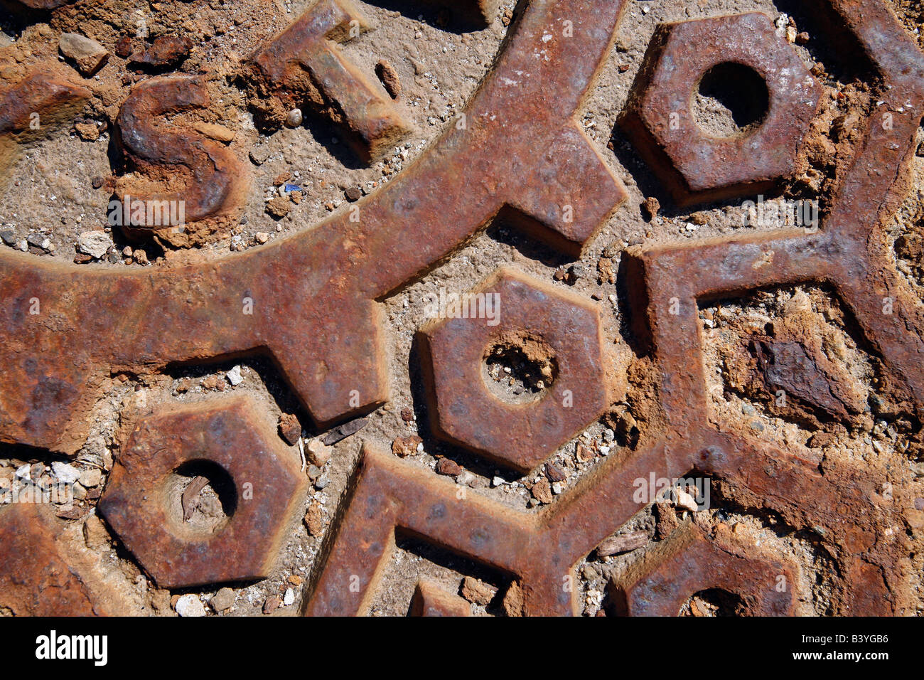rusted metal manhole cover Stock Photo