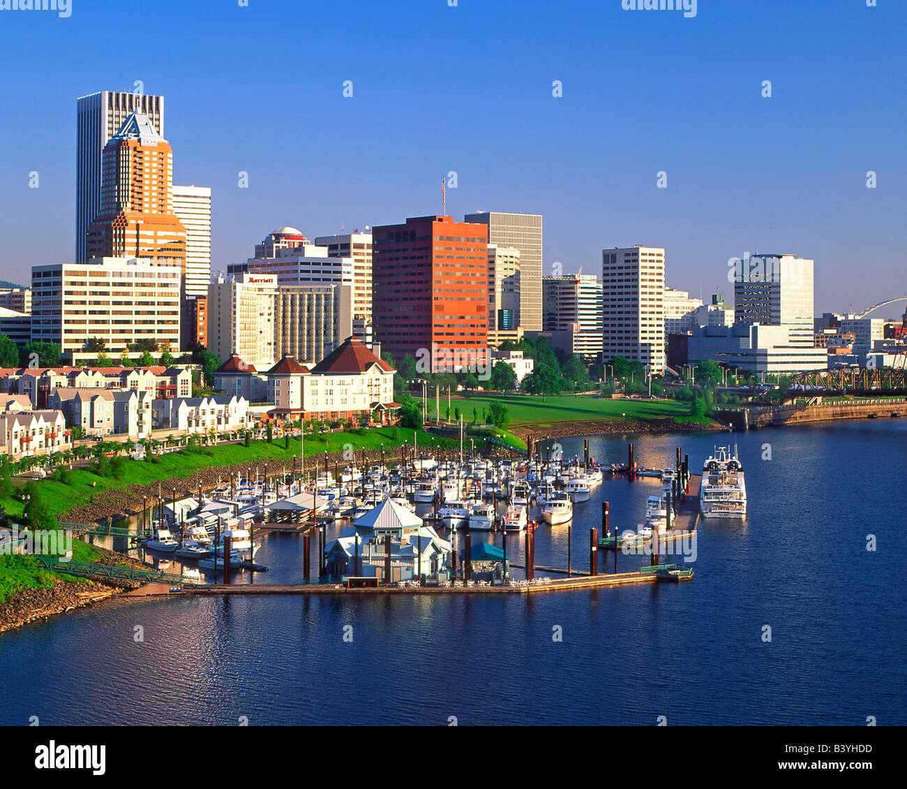 USA, Oregon, Portland. Downtown skyline & Riverplace Marina at Tom