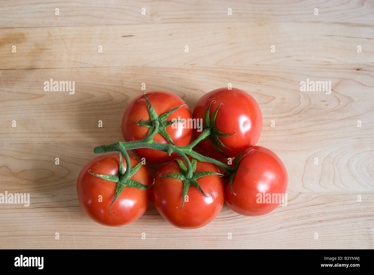 Vine ripened tomatoes Stock Photo Alamy