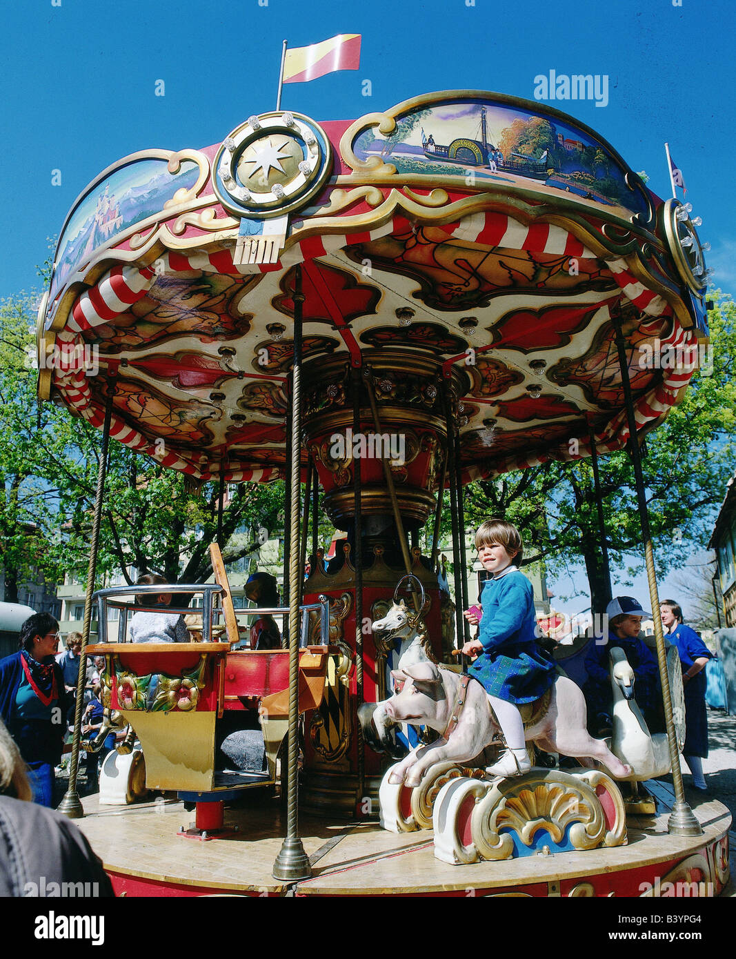 geography / travel, Germany, Bavaria, Munich, markets, Auer Dult, fair, market, child in whirligig, merry-go-round, carousel, carrousel, roundabout, children, Stock Photo