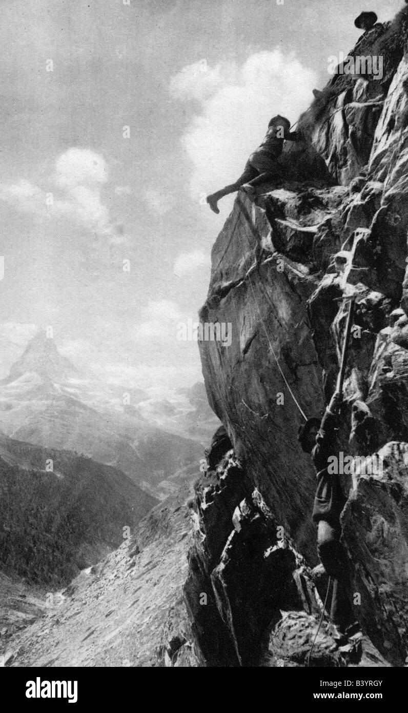 mountaineering, mountain hikes, mountaineers in the rock front, Matterhorn in the background, posrcard, early 20th century, mountains, Alps, Switzerland, Valais, historic, historical, people, 1900s, 1910s, Stock Photo