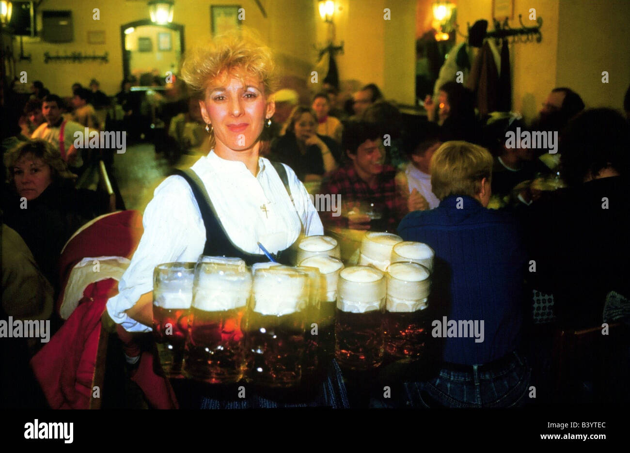 geography / travel, Germany, Bavaria, Munich, gastronomy, Hofbraeuhaus, waitress with 12 glasses, beer mug, tankard, Stock Photo