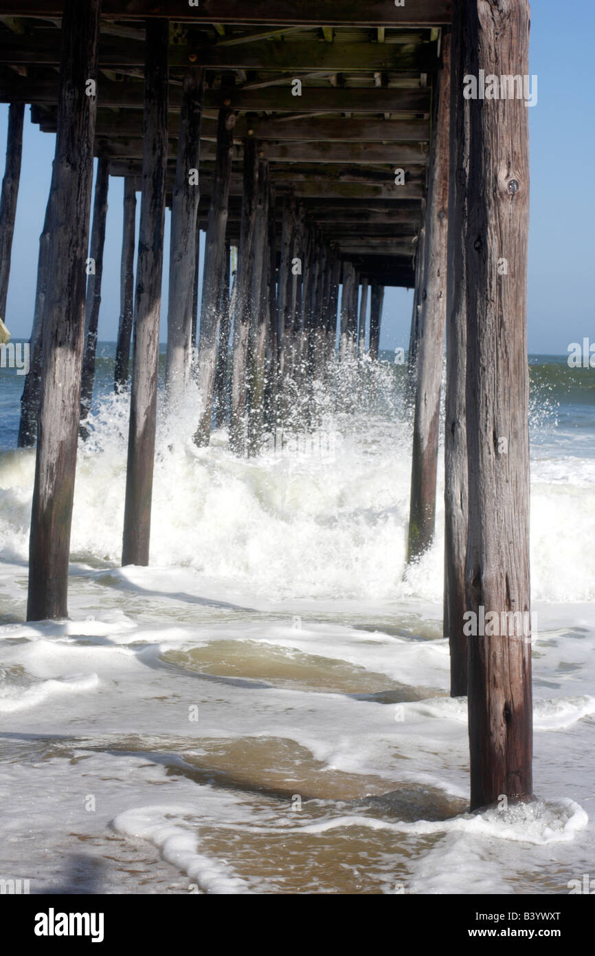 Ocean waves crashing under wooden hi-res stock photography and images ...