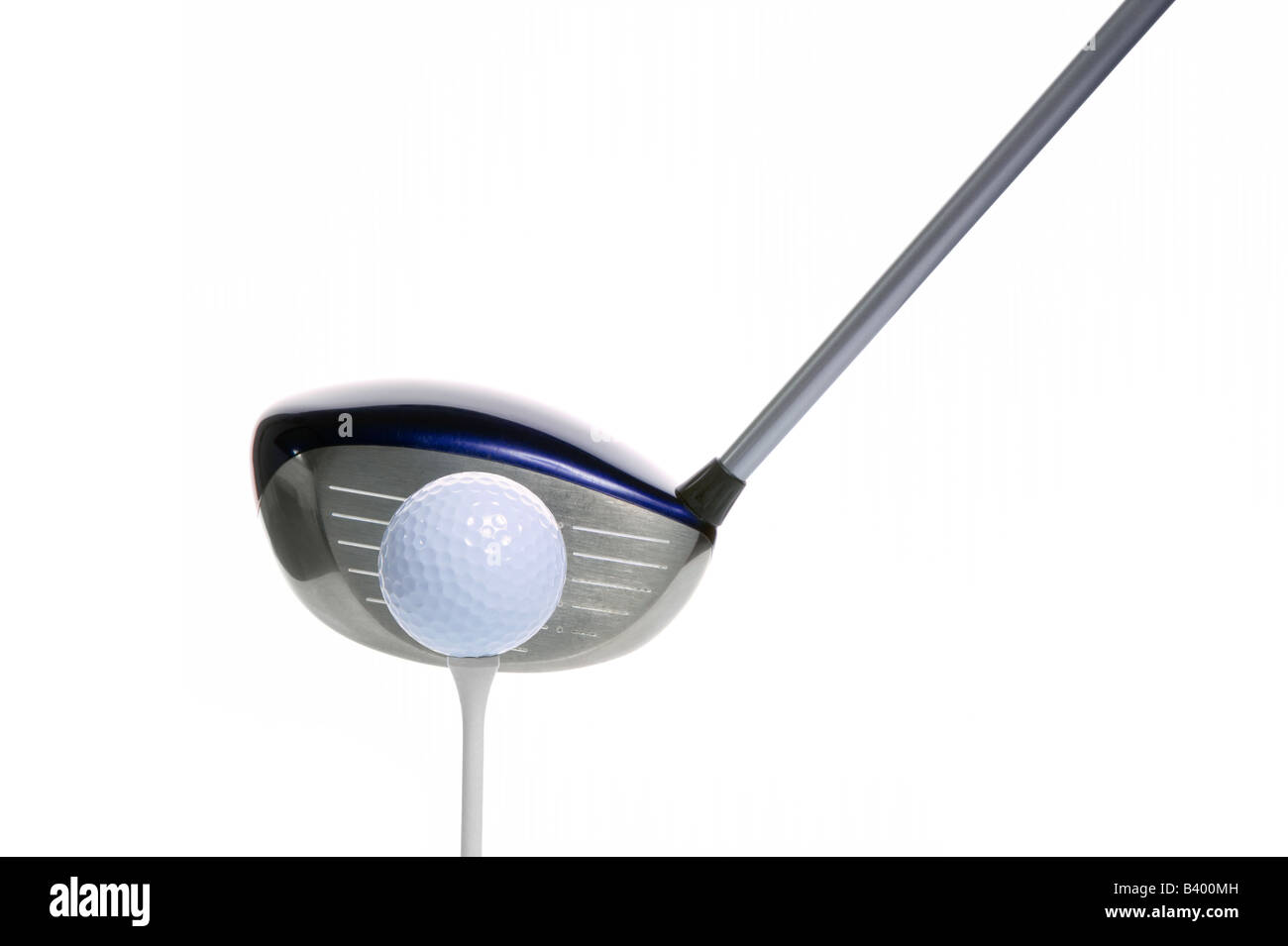 Golf driver behind a golf ball and tee isolated on a white background Stock Photo