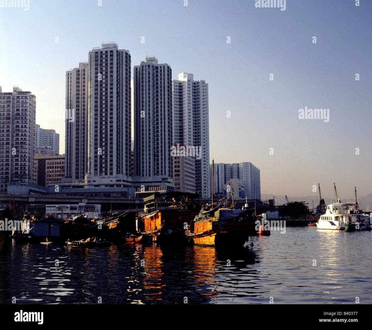 geography / travel, Hong Kong, Aberdeen's port, junks, setting sun, skyscrapers, , Stock Photo