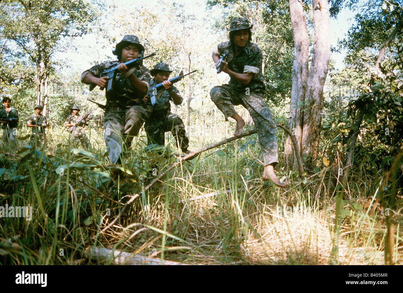 geography / travel, Cambodia, armed forces, Khmer Guerillias, exercise in the jungle, with US assault rifles M16, approx. end of the 1970s, seventies, during occupation by Vietnam, weapons, gun, Stock Photo