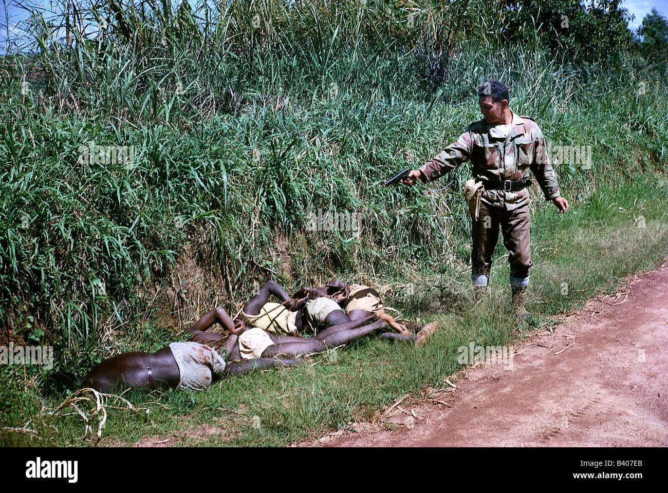 geography / travel, Congo, Simba uprising 1964 - 1965, mercenary shooting a civilist, December 1964, Stock Photo