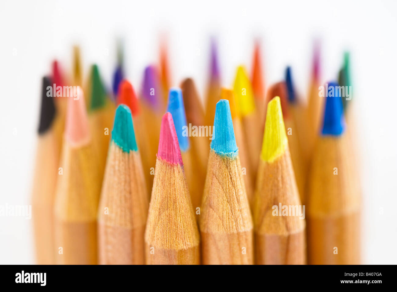 A variety of coloured pencils grouped together Stock Photo