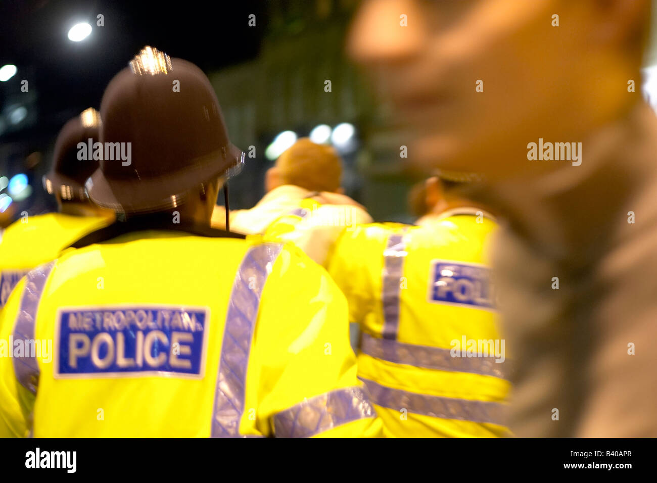 police officers at night on patrol Stock Photo Alamy