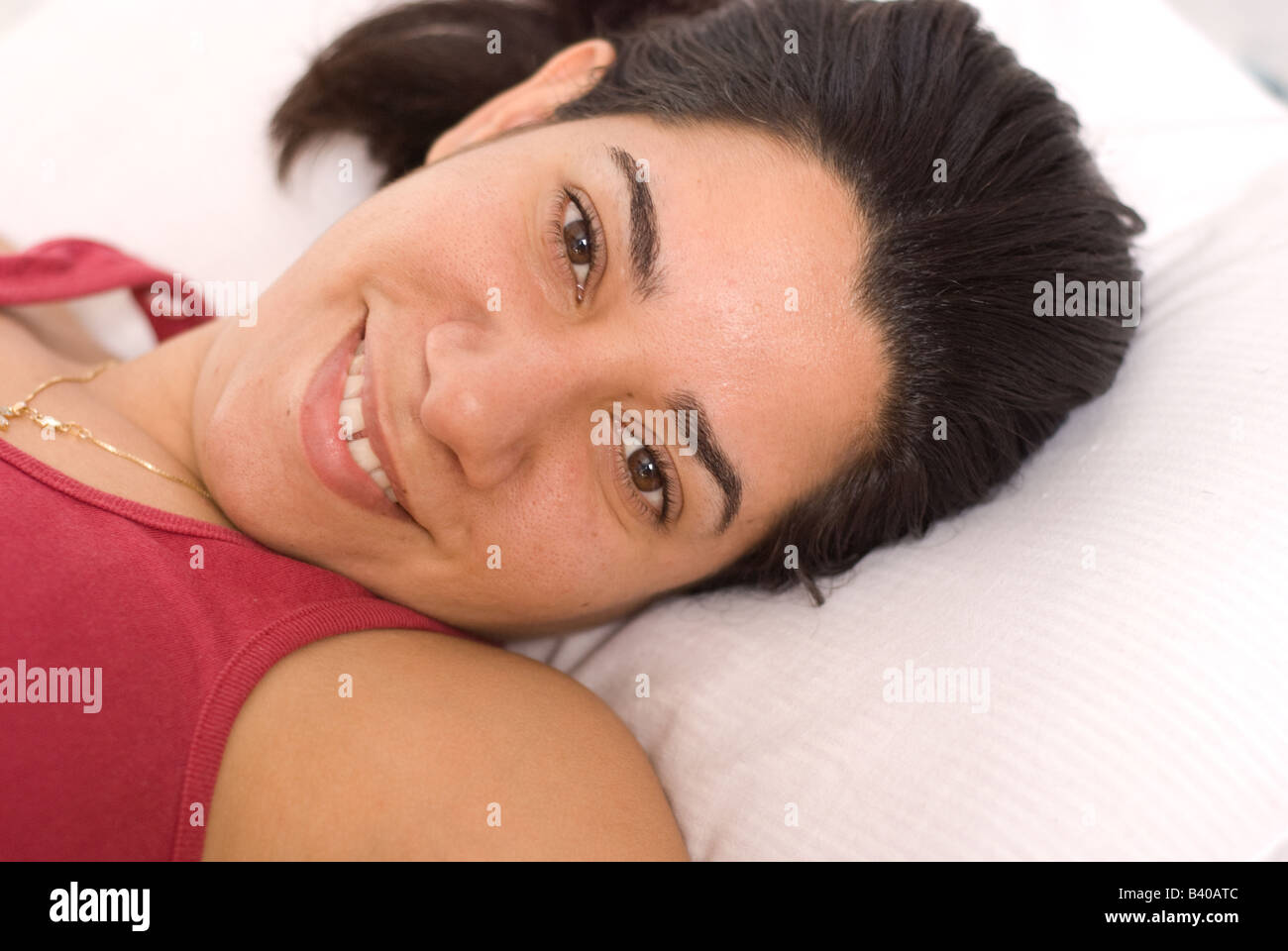 Beautiful latina woman curly hi-res stock photography and images - Alamy