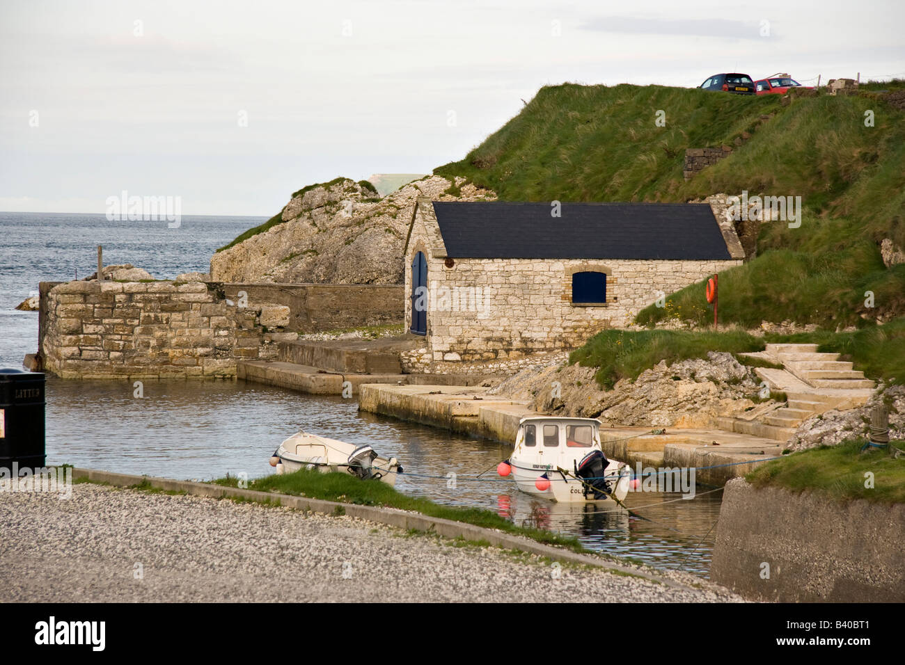 a boathouse in the little harbour of Ballintoy Stock Photo Alamy