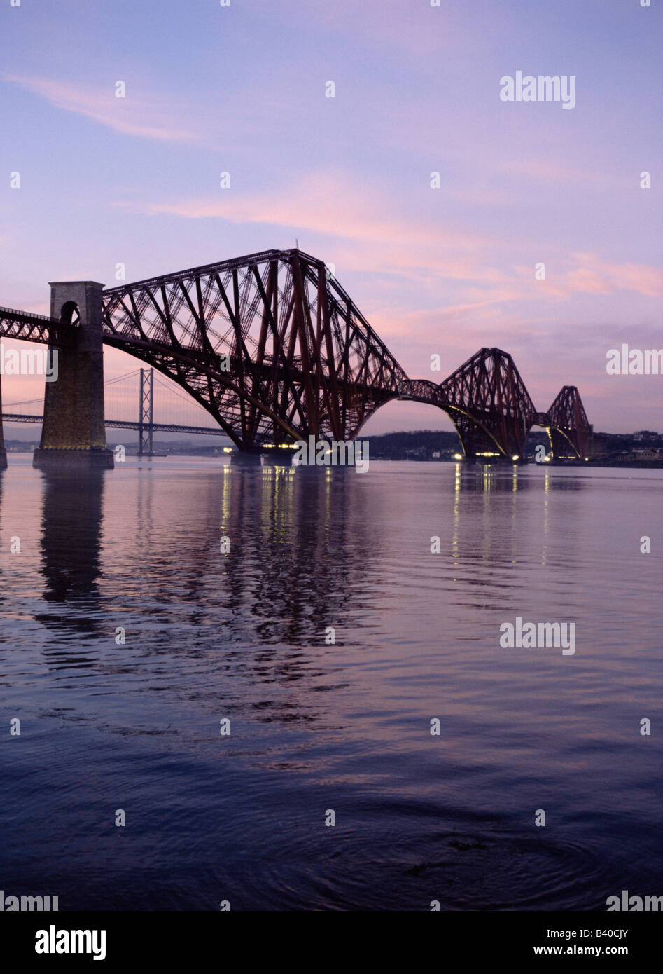 dh Forth Railway Bridge RAIL BRIDGE FORTH BRIDGE Victorian Cantilever steel granite Firth of Forth river sunset scotland dusk lothian Stock Photo