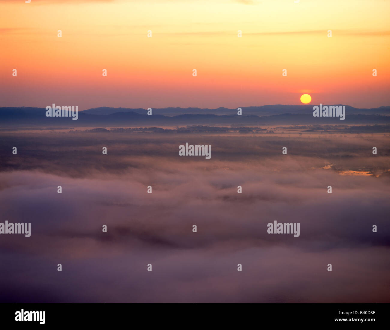 Sunrise and fog, Minnesota Stock Photo