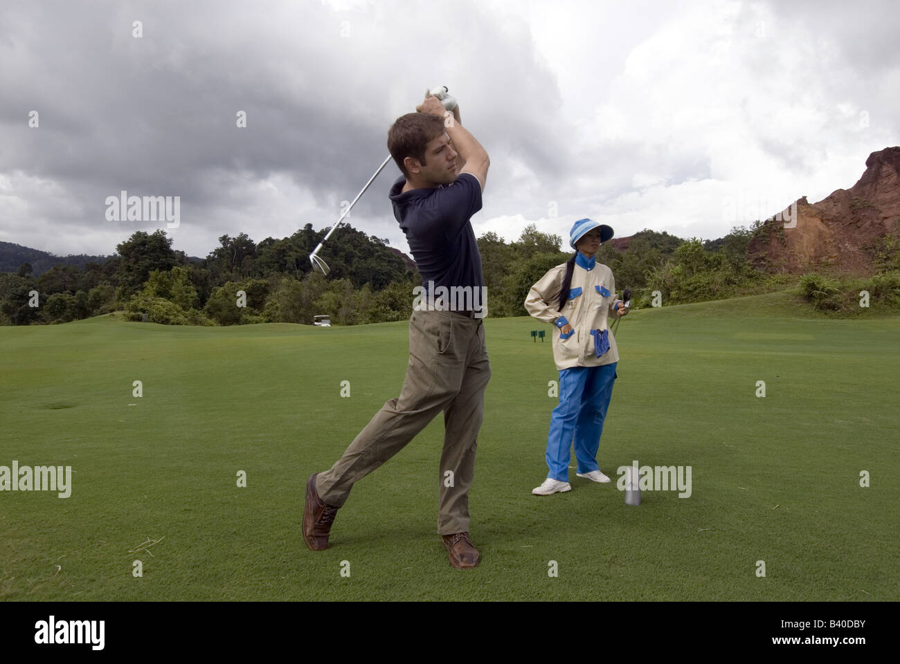 Golf caddies. Phuket Thailand Stock Photo Alamy