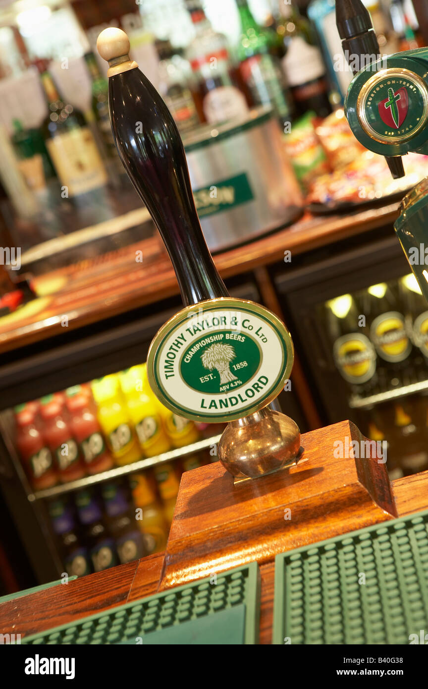 TIMOTHY TAYLOR LANDLORD BEER PUMP IN PUBLIC HOUSE Stock Photo