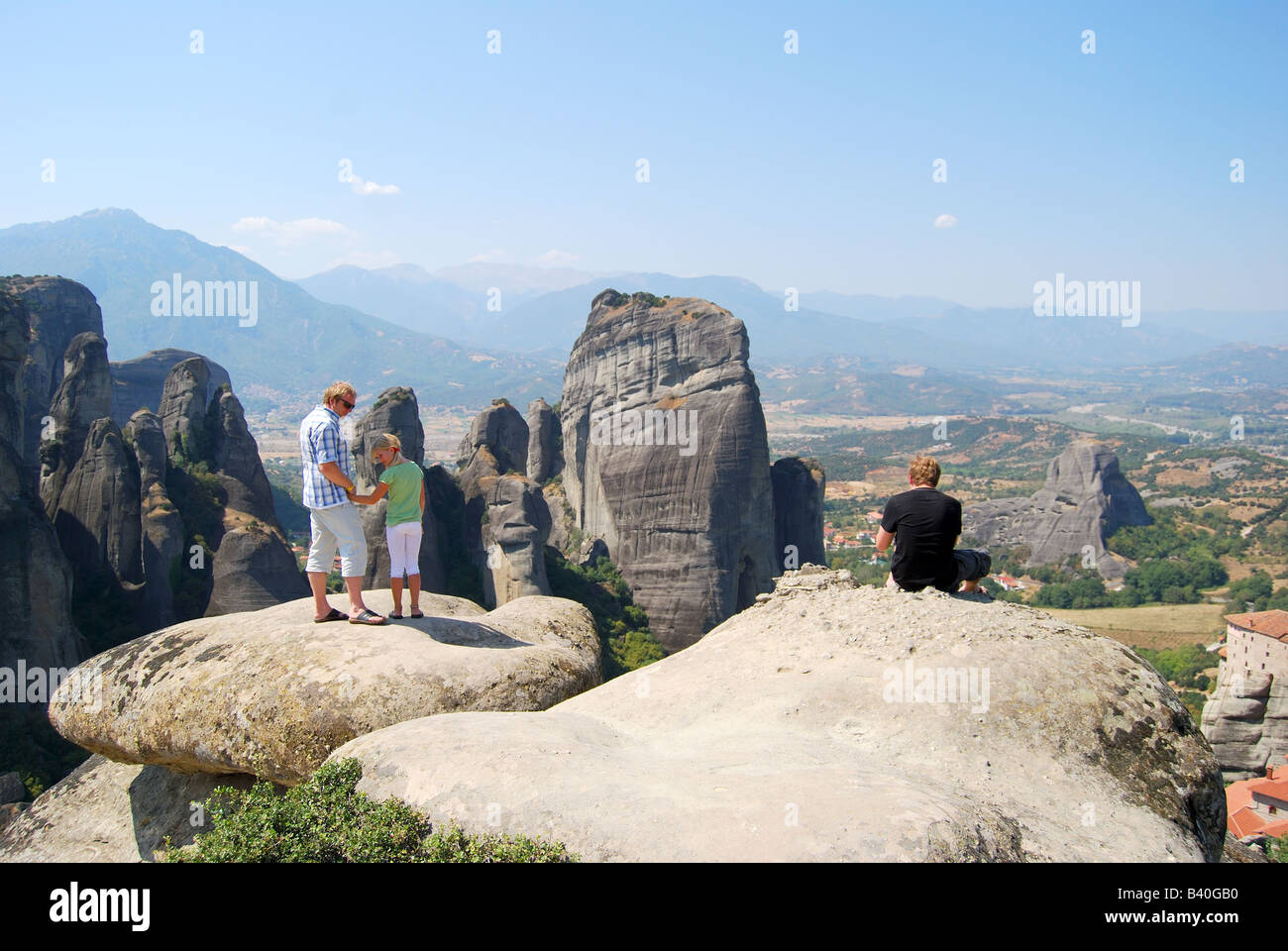 Father and children at Meteora Valley lookout, Meteora, Kalampaka, Trikala, Thessaly, Greece Stock Photo
