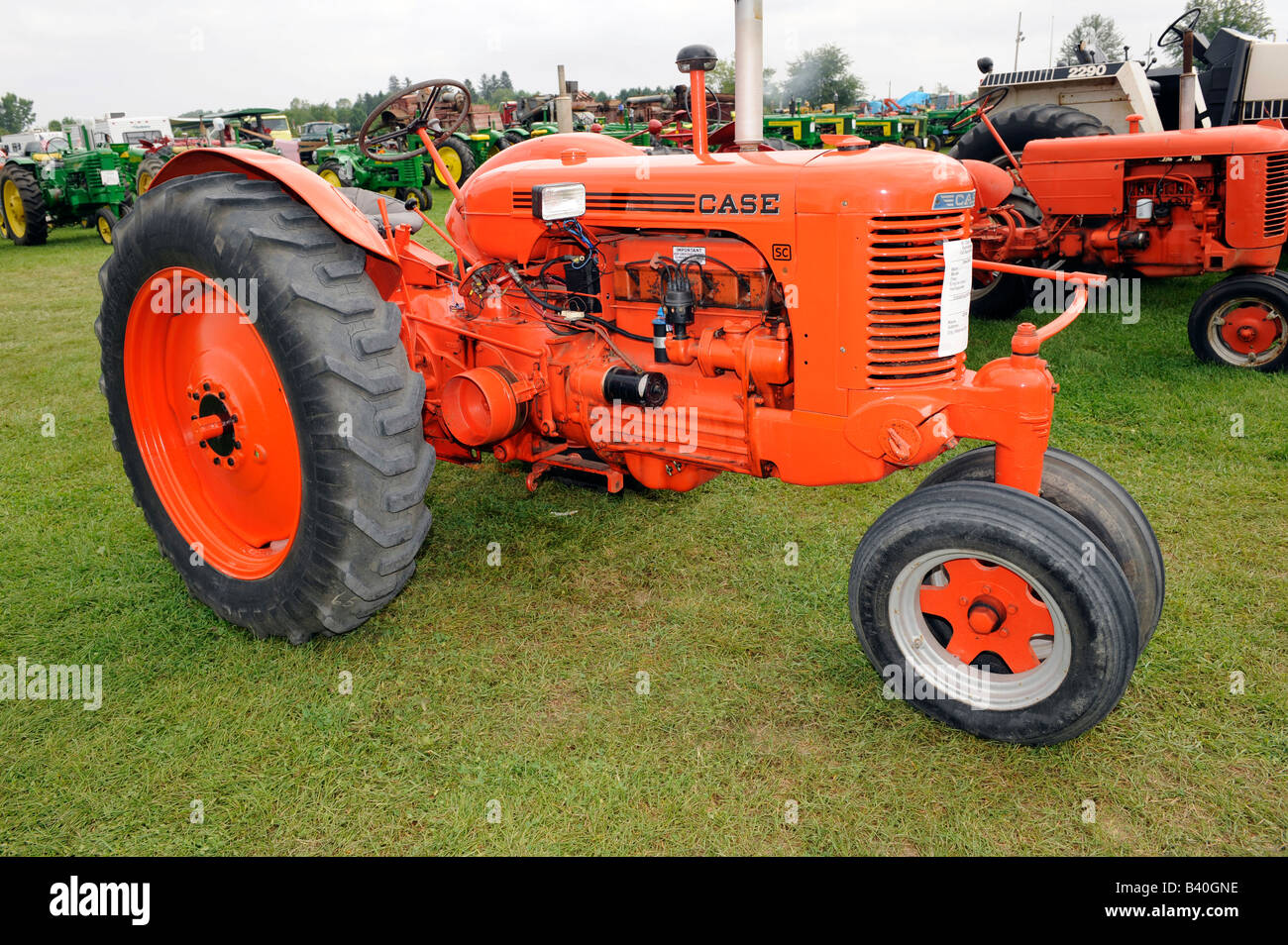 Old farm tractors on display at historic farm demonstration Michigan