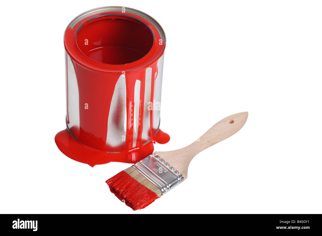 Can of red paint and paint brush cut out isolated on white background Stock Photo