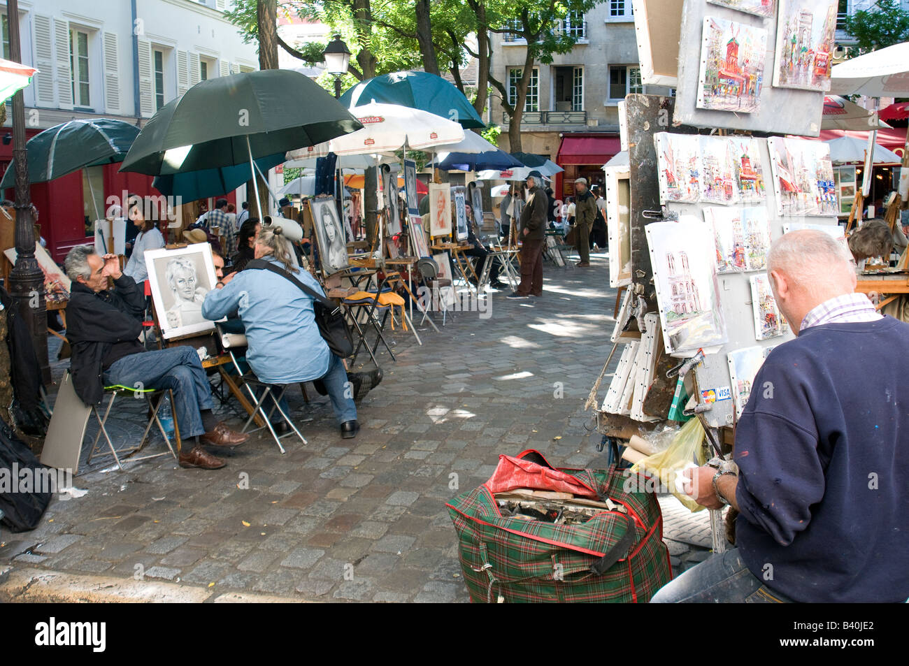 Painters in a square in Montmartre district in Paris, France Stock Photo