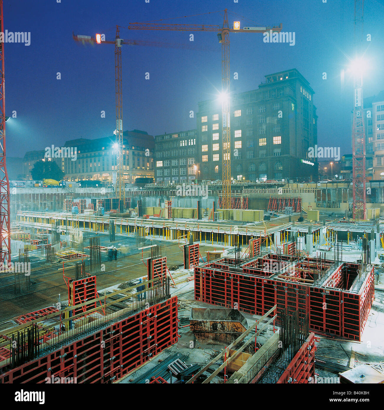Illuminated construction site at night Stock Photo