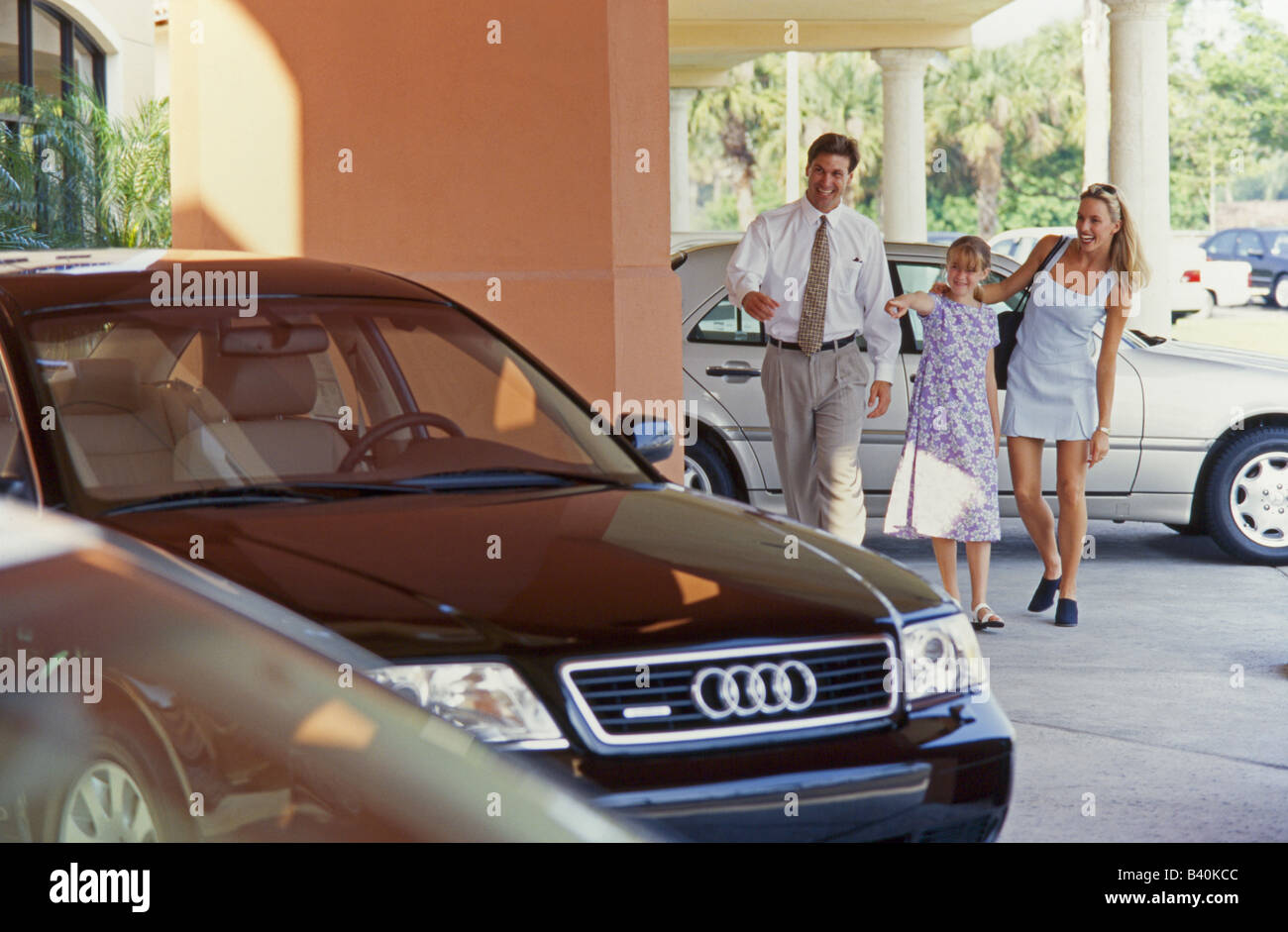 Family shopping for car, Miami Stock Photo Alamy