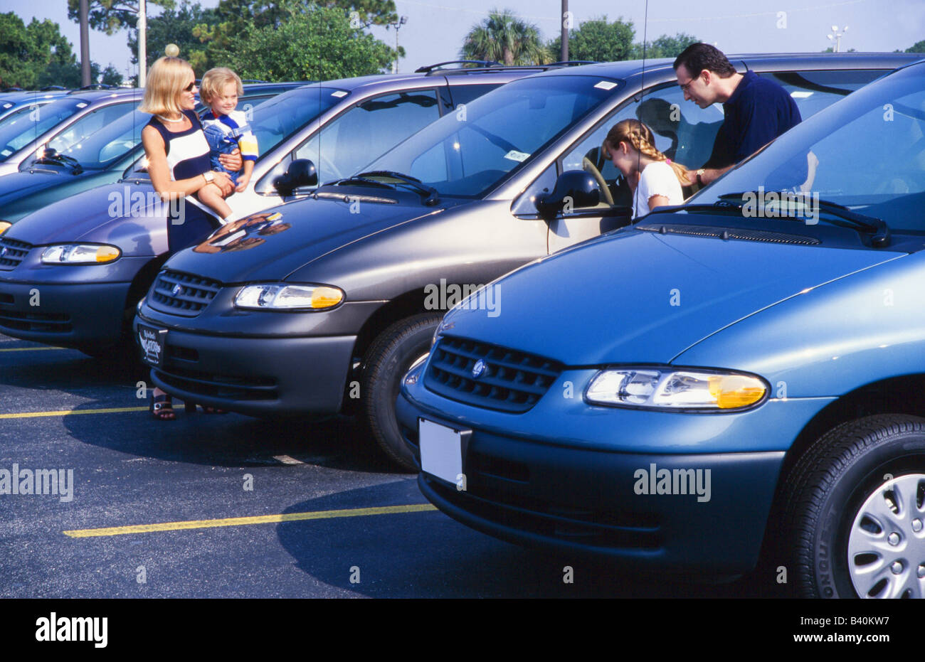 Family shopping for minivan, Miami Stock Photo