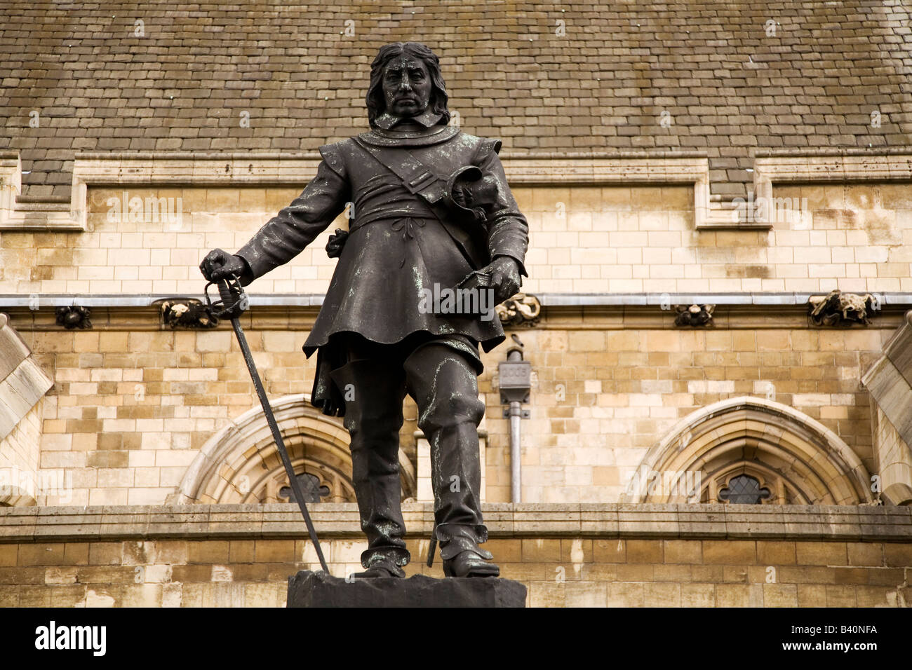 The statue of Oliver Cromwell (1599- 1658) that stands outside of the Houses of Parliament in Westminster, England. Stock Photo