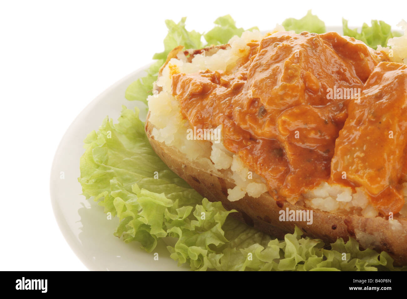 Freshly Baked Jacket Potato Filled With Indian Style Spicy Chicken Tikka  Masala Curry And No People Stock Photo - Alamy